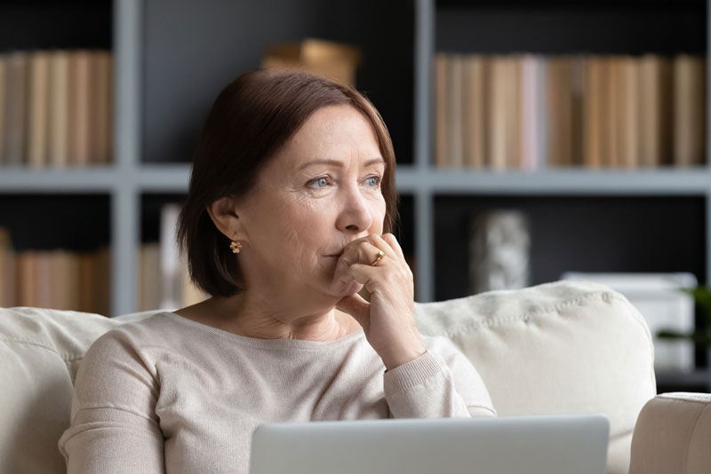 Dental Patient Wondering If She Should Get Dental Implants Or Dentures in Albuquerque, NM