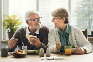 Dental Implant Patients Eating Together In Albuquerque, NM